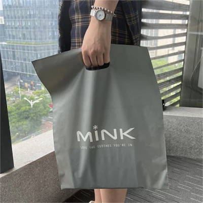 Desain logo tas pegangan cetak